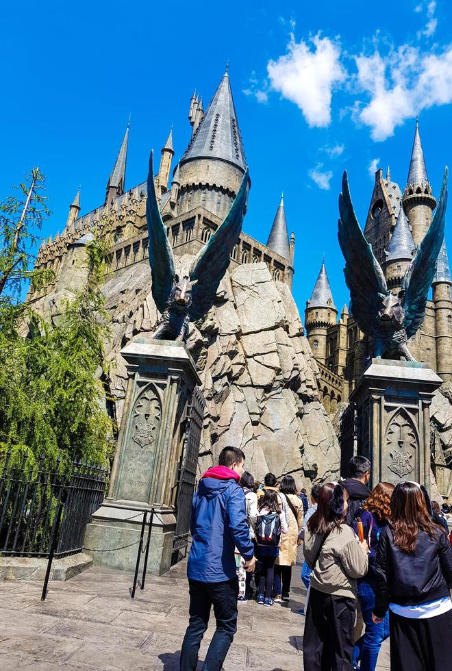 Osaka, Indonesia on April 9, 2019. Tourists are lining up to enter Hogwarts Castle at Universal Studios Japan photo