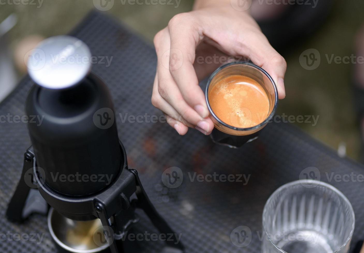 Beautiful crema coffee in a glass. photo