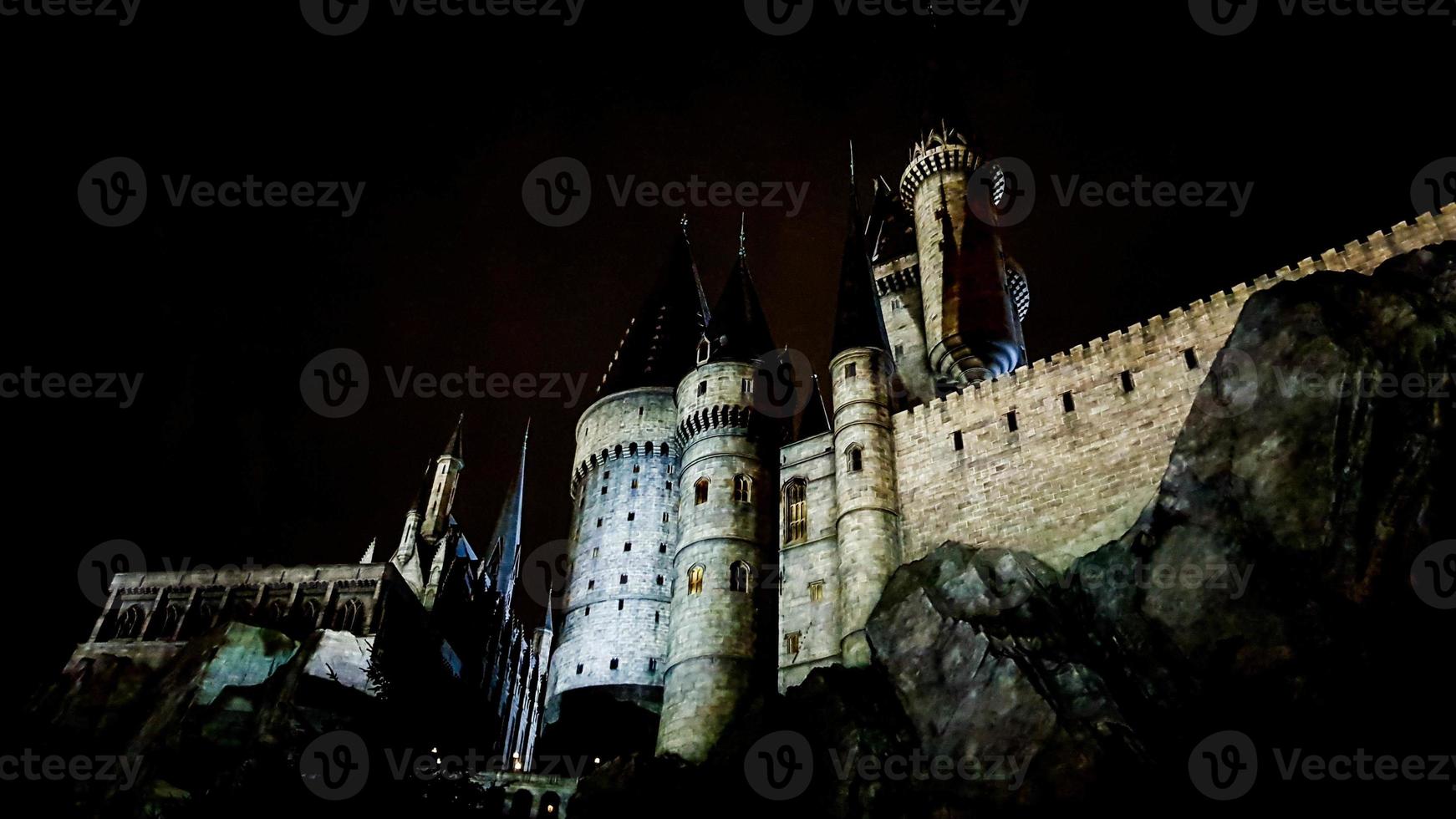 Osaka, Japan on July 8, 2019. A very beautiful light show at night at Hogwarts Castle that you must and must see when you visit Universal Studios Japan. photo