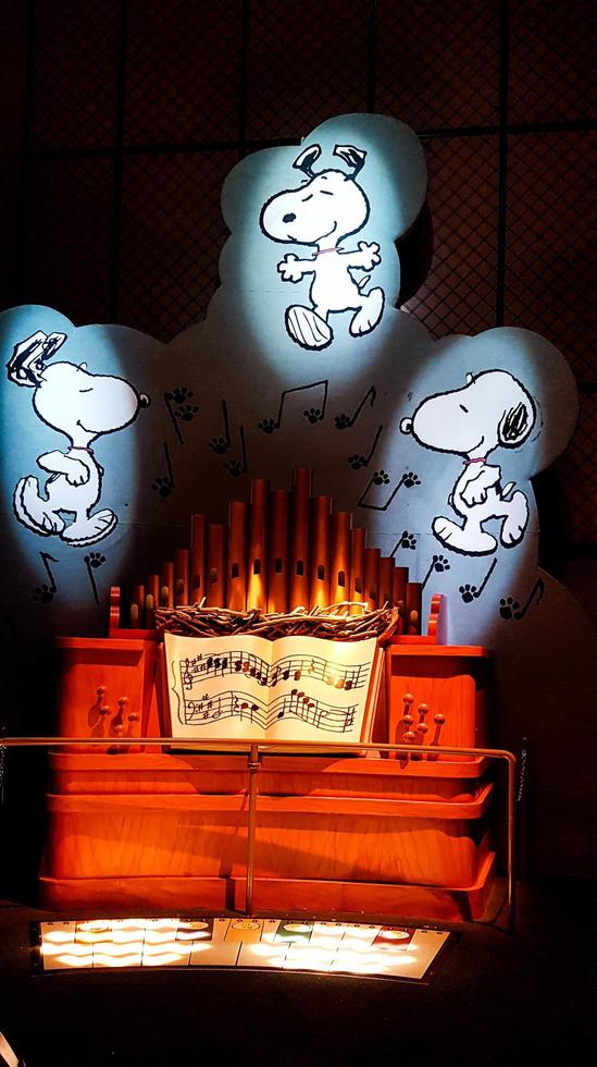 Osaka, Japan on April 8, 2022. A piano with a snoopy image, perfect for children to play. photo