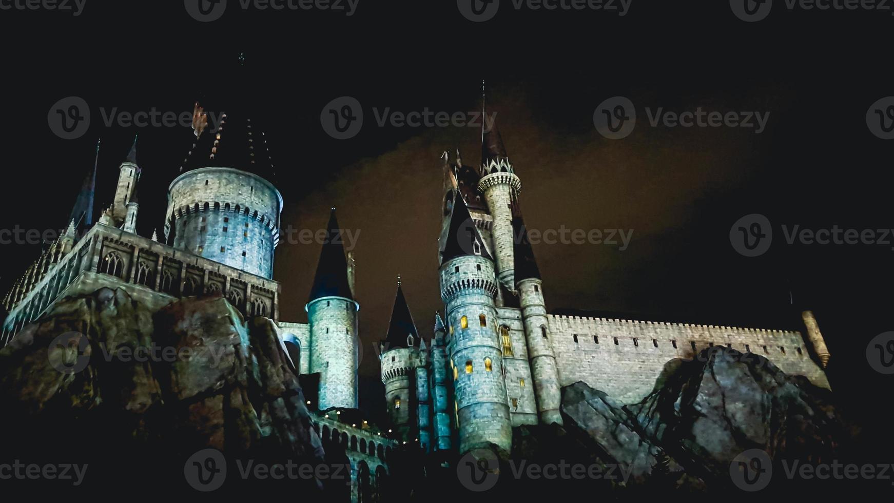 Osaka, Japan on July 8, 2019. A very beautiful light show at night at Hogwarts Castle that you must and must see when you visit Universal Studios Japan. photo