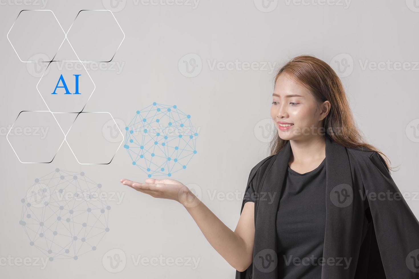 AI theme with girl holding AI text. photo