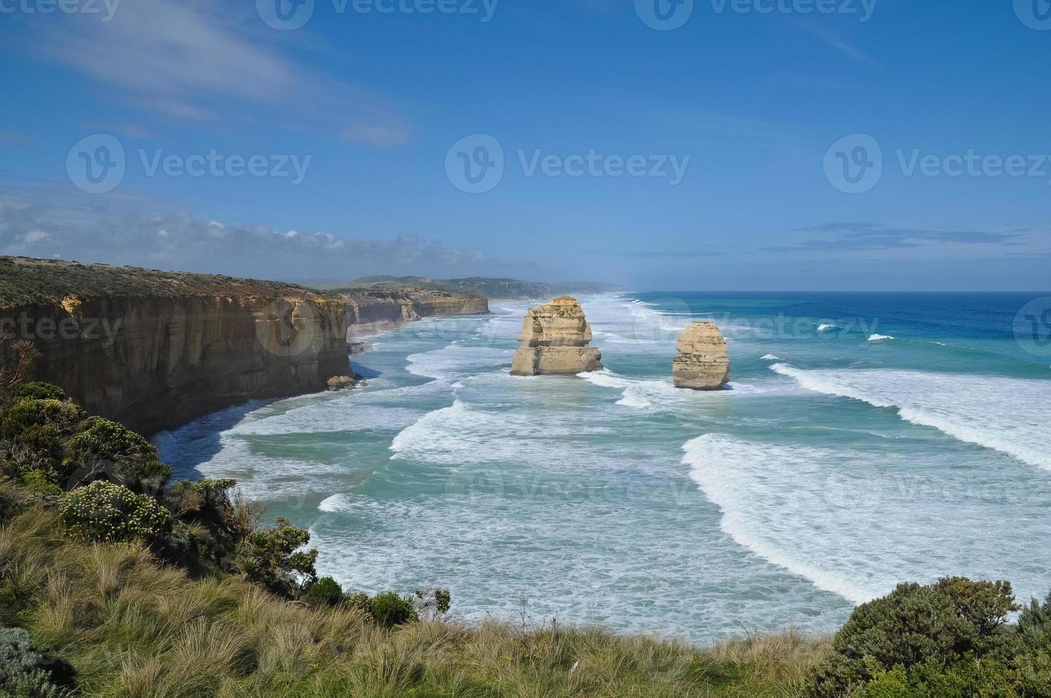 Sunny ocean and twelve apostles in Great Ocean Road scenic site photo
