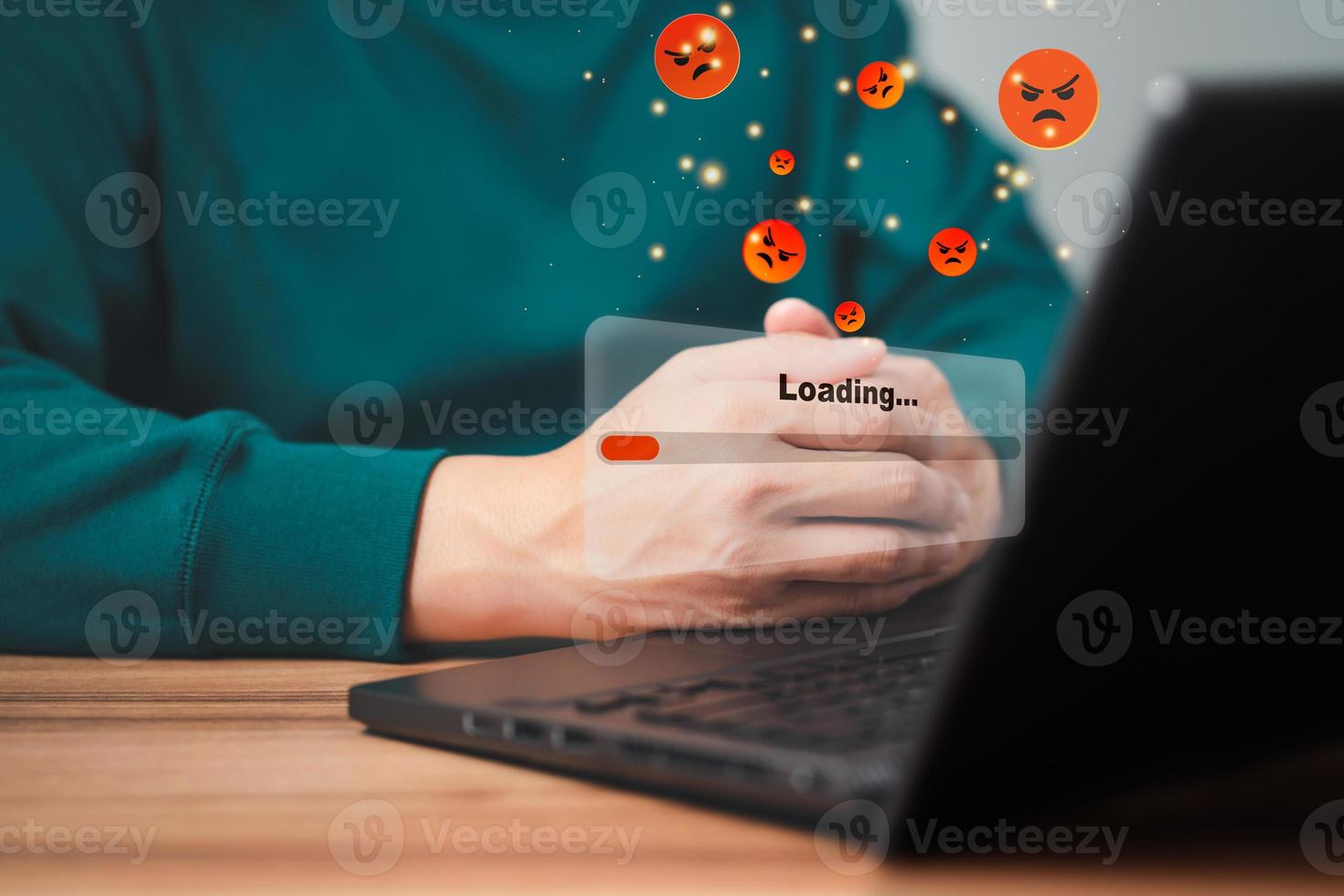 Man using laptop for download and waiting to loading digital business data form website, concept of waiting for load of loading bar. photo