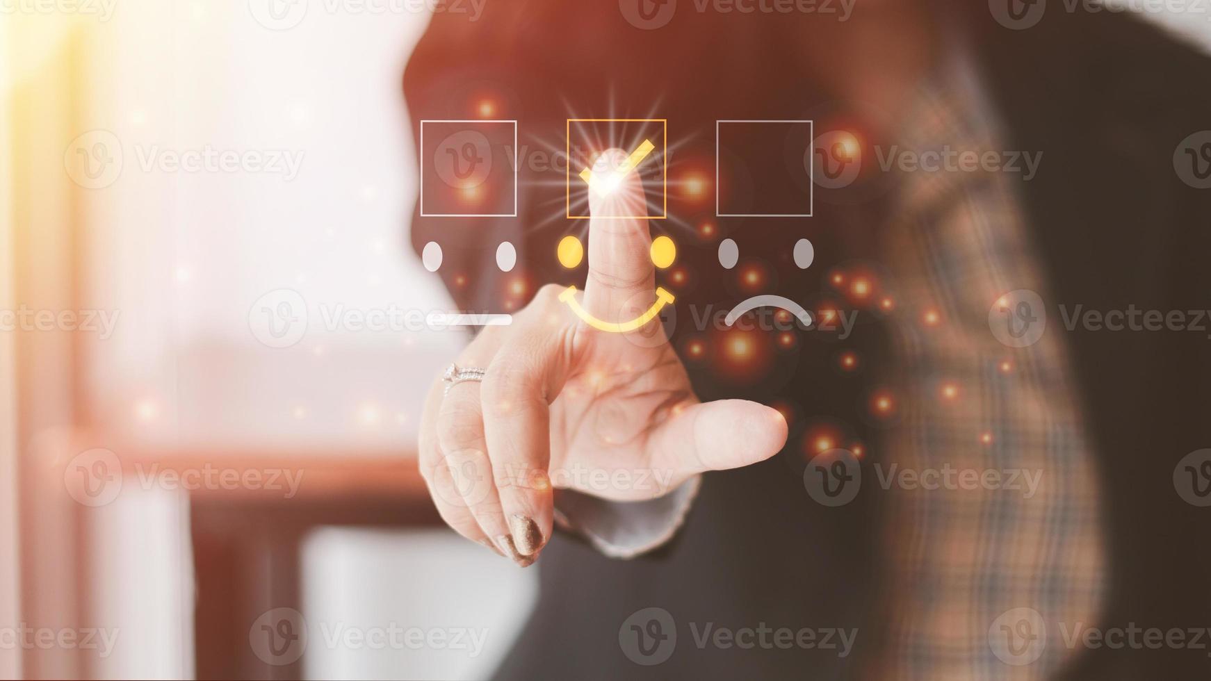 Customer service and Satisfaction concept Men's hands doing online assessments in the satisfaction rating the popular service company allows customers in order to improve and develop the organization photo