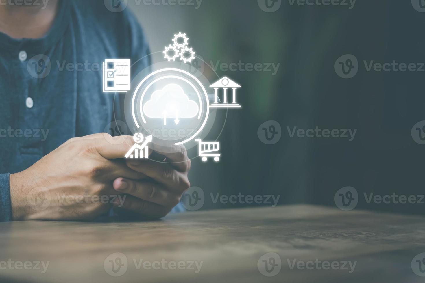 Cloud technology data storag concept, man's hand using a smartphone to use, backup, store in Cloud Data storag as an online connection. Files can be retrieved at any time. convenient and safe photo