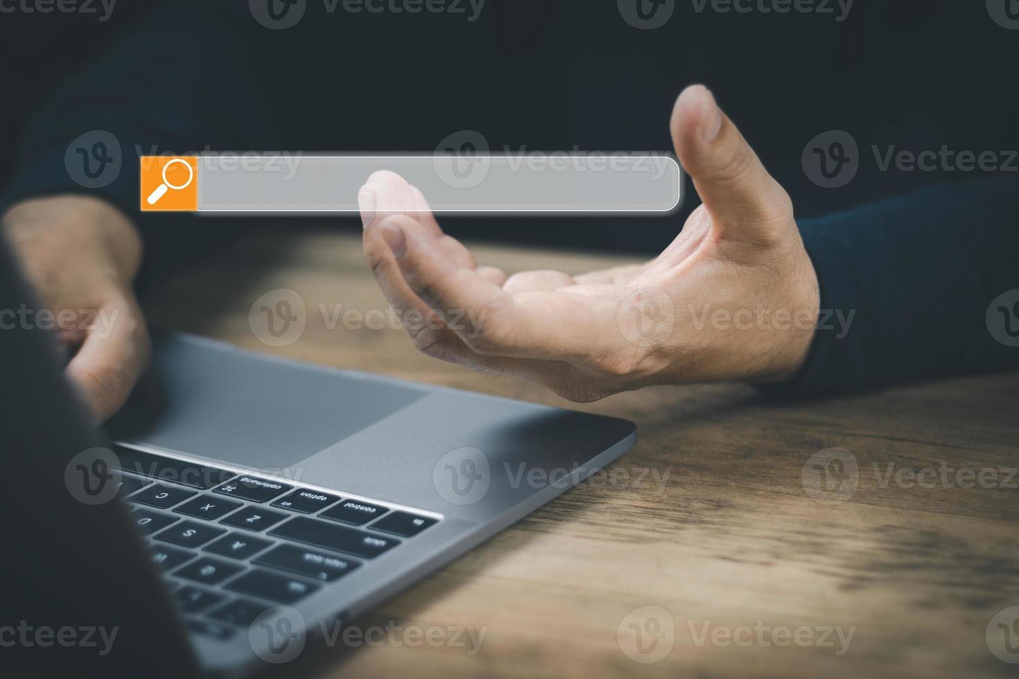 The concept of using technology to search for information, a man's hand is using a smartphone to search for information on social media via the Internet online. photo