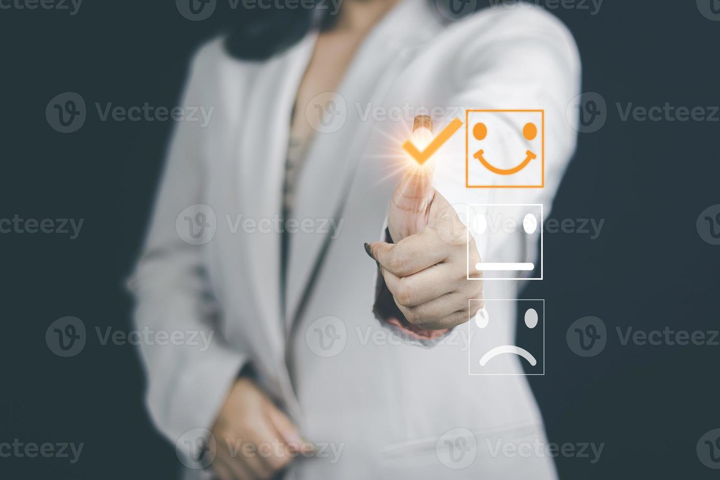 Cuswomen's hands doing online assessments in the satisfaction rating the popular service company allows customers in order to improve and develop the organization photo