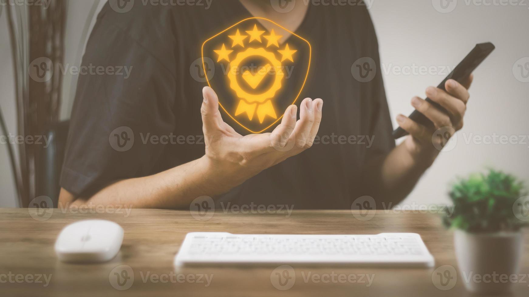 Customer service and Satisfaction concept Men's hands doing online assessments in the satisfaction rating the popular service company allows customers in order to improve and develop the organization photo