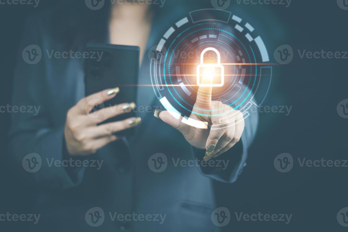 cyber security concept, woman's hand using a smartphone Log in to applications via fingerprint scanning. It is the security of the information. photo