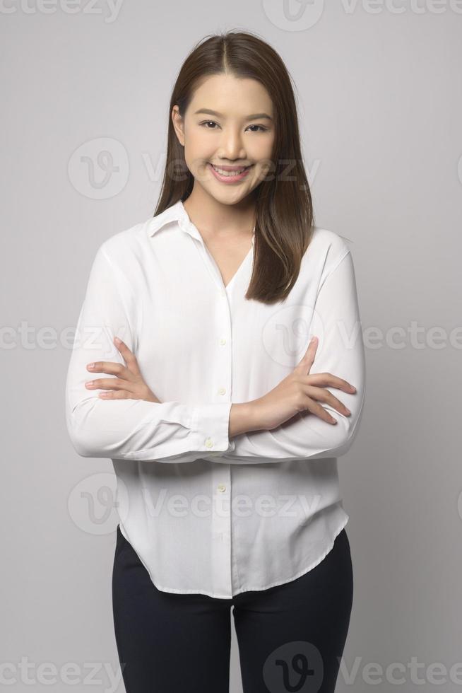 Portrait of beautiful asian woman over white background studio. photo