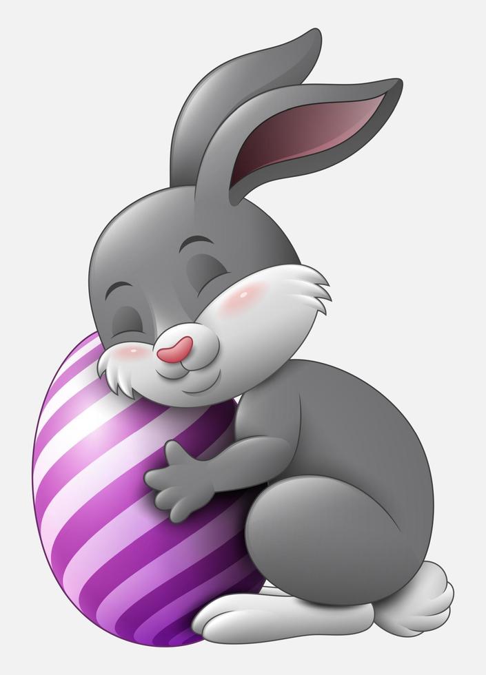 Cute grey Easter Bunny hugged egg decorated isolated on a white background vector