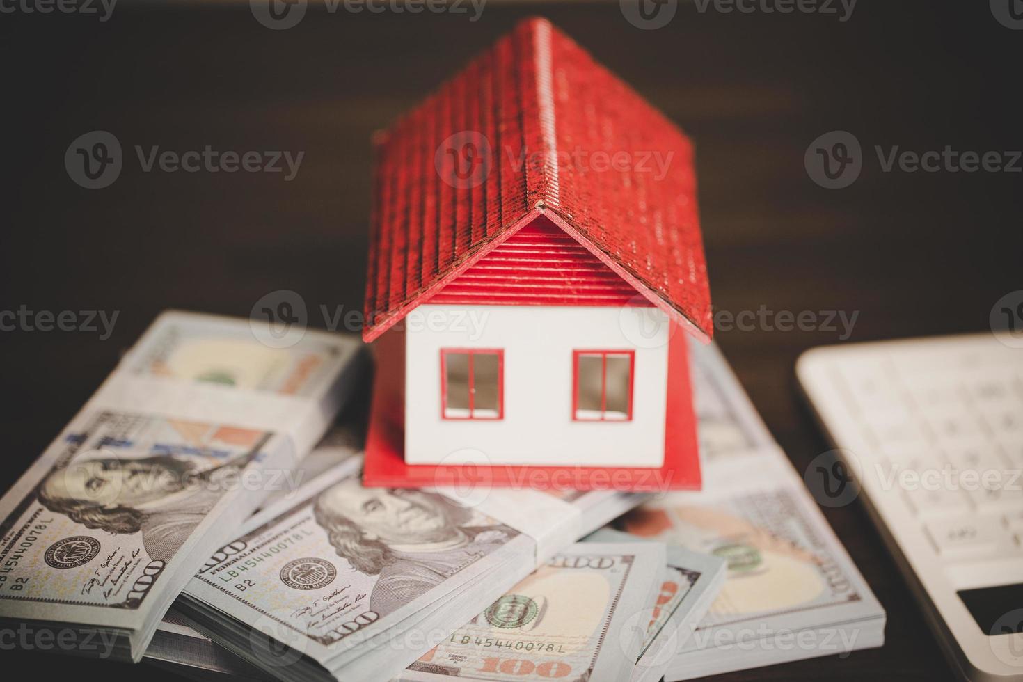 house property mortgage with cash money dollar bill on table concept of business finance, saving for buy home, investment loan, american currency, sale estate, bank payment, sell-rent real estate photo