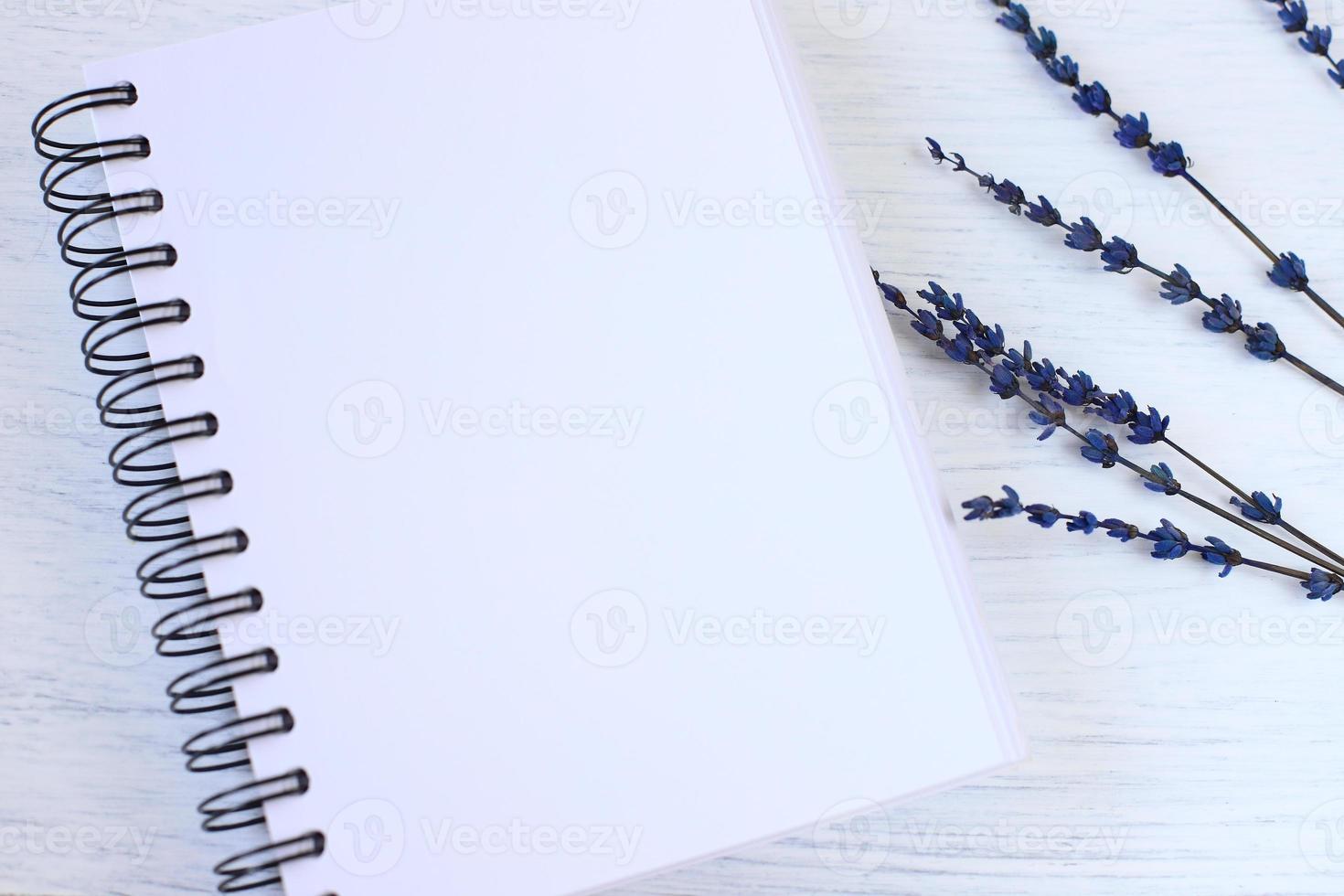 Blank notebook mockup and lavender flowers photo