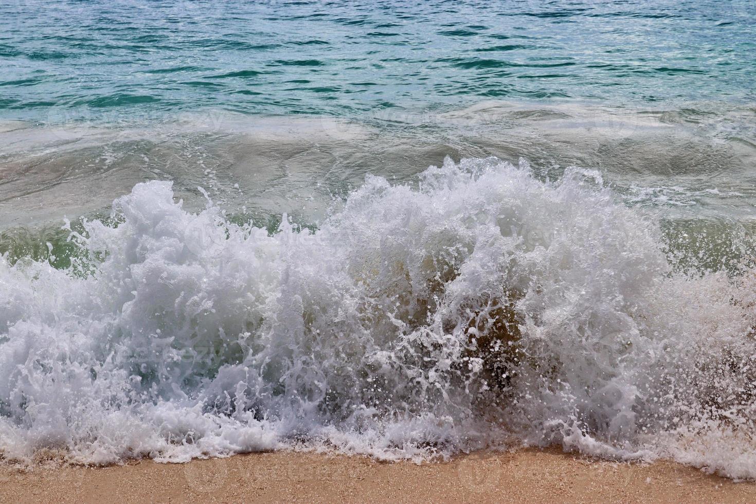 Stunning indian ocean waves at the beaches on the paradise island seychelles photo