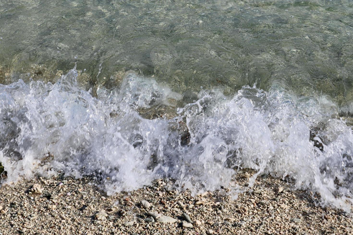 Stunning indian ocean waves at the beaches on the paradise island seychelles photo