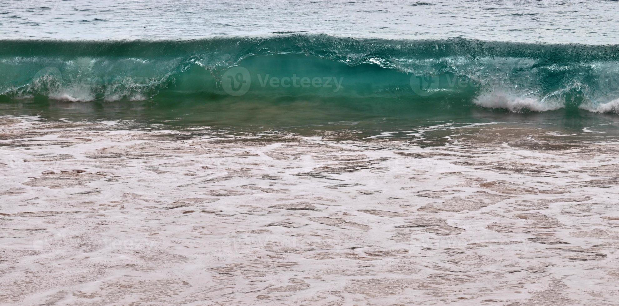 Stunning indian ocean waves at the beaches on the paradise island seychelles photo