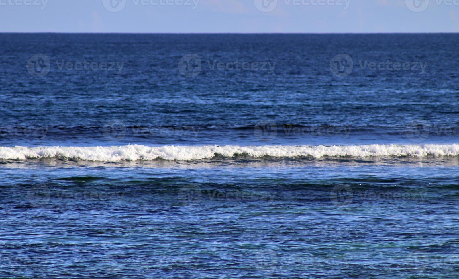 Stunning indian ocean waves at the beaches on the paradise island seychelles photo