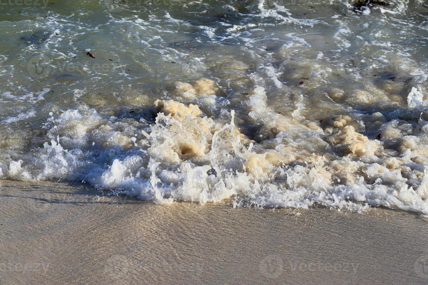 Stunning indian ocean waves at the beaches on the paradise island seychelles photo