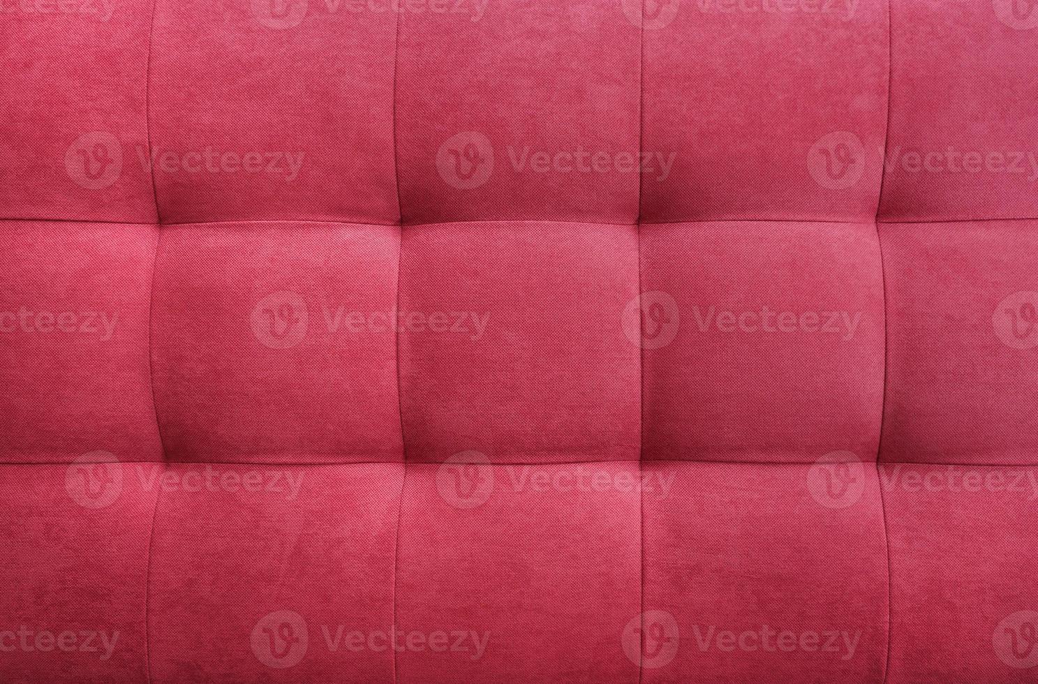 Red suede leather background, classic checkered pattern for furniture, wall, headboard photo