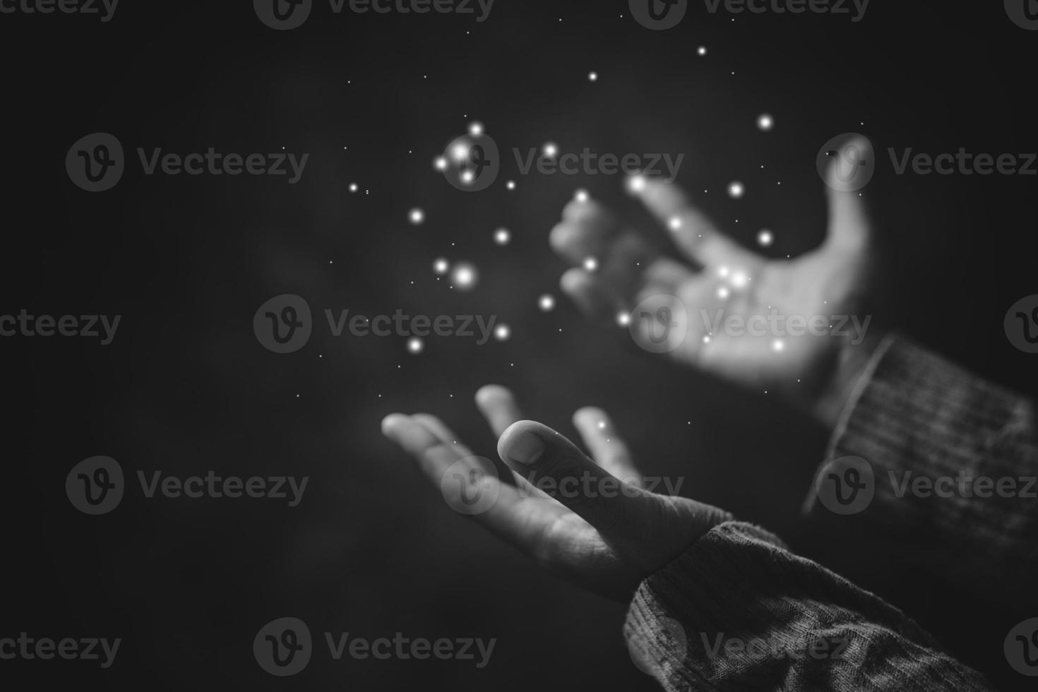 Prayer person hand in black background. Christian catholic woman are praying to god in dark at church. Girl believe and faith in jesus christ. Christ religion and christianity worship or pray concept. photo