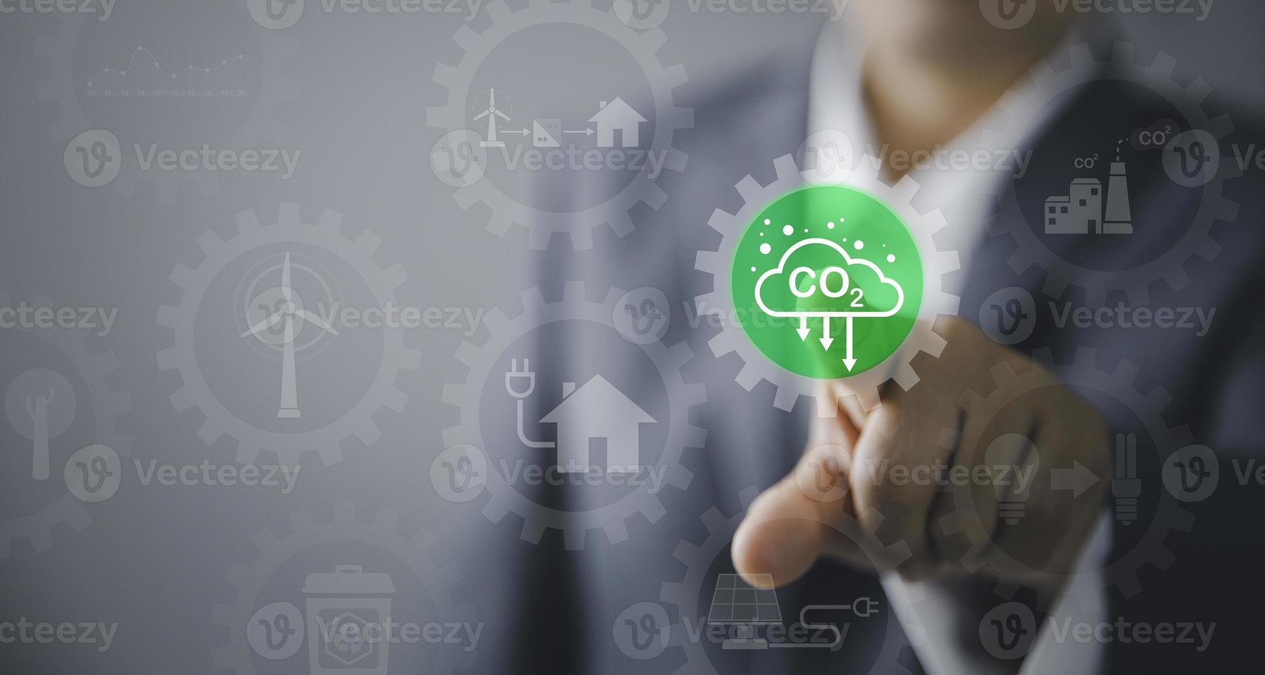 Sustainable development and innovation green business concept. Businesswoman working virtual globe modern computer to reduce CO2 emissions carbon footprint climate change to limit global warming. photo