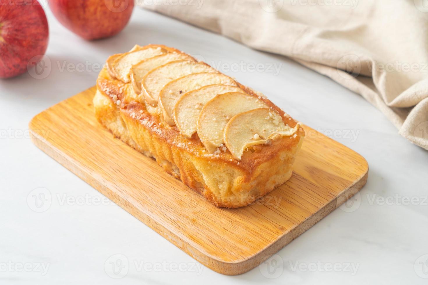 apple loaf crumbled on wood board photo