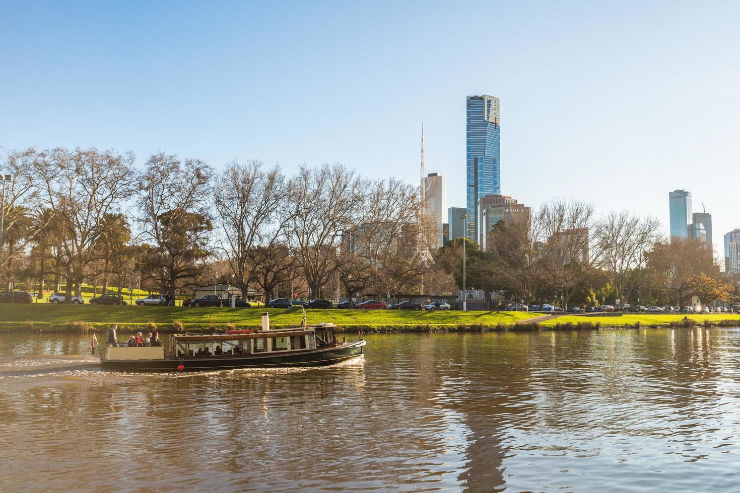 Melbourne, Australia - October 14 2015 - Tourist traveling by boat along the Yarra river to see the view of Melbourne the most liveable city in the world. photo