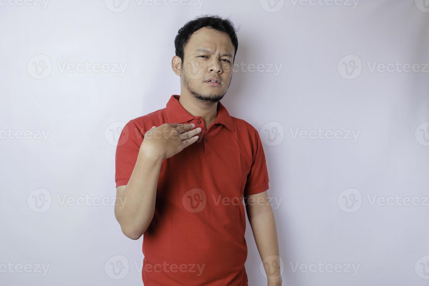 Attractive Asian man with hand gesture pose rejection or prohibition with copy space photo