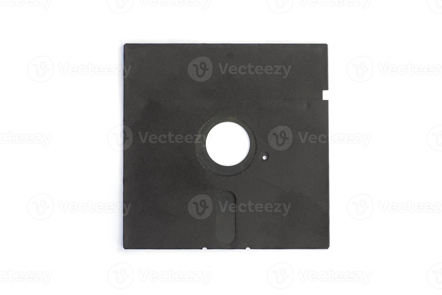 Old black diskette 5.25 inches for vintage computer isolated on white background. photo