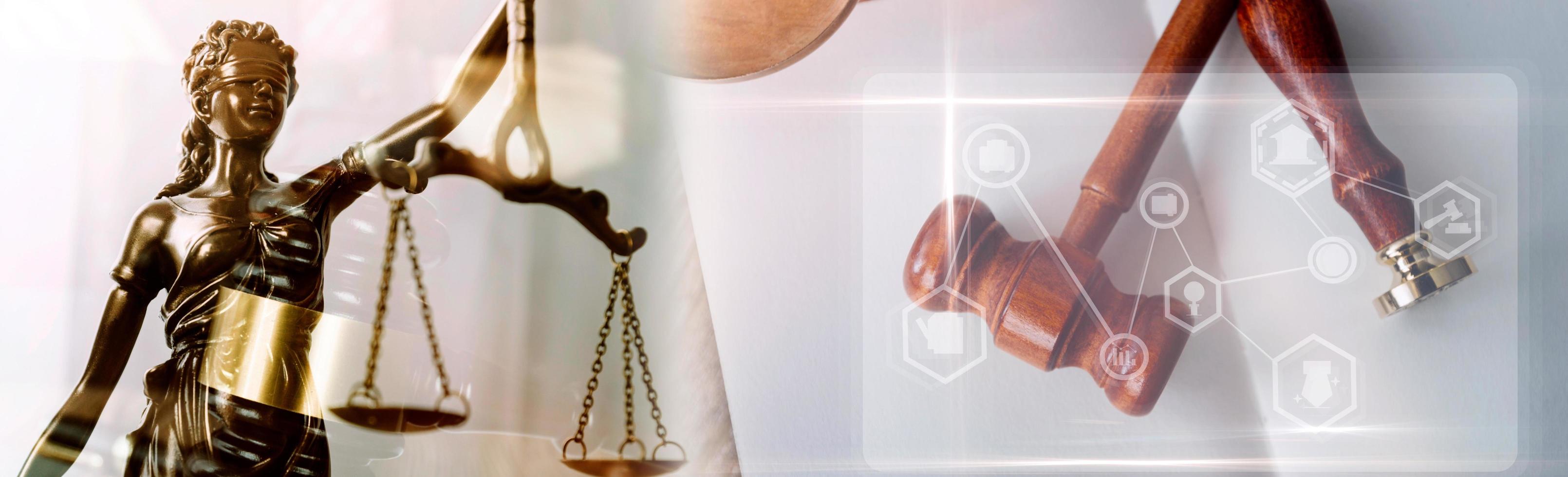 Justice and law concept.Male judge in a courtroom with the gavel, working with, computer and docking keyboard, eyeglasses, on table in morning light photo