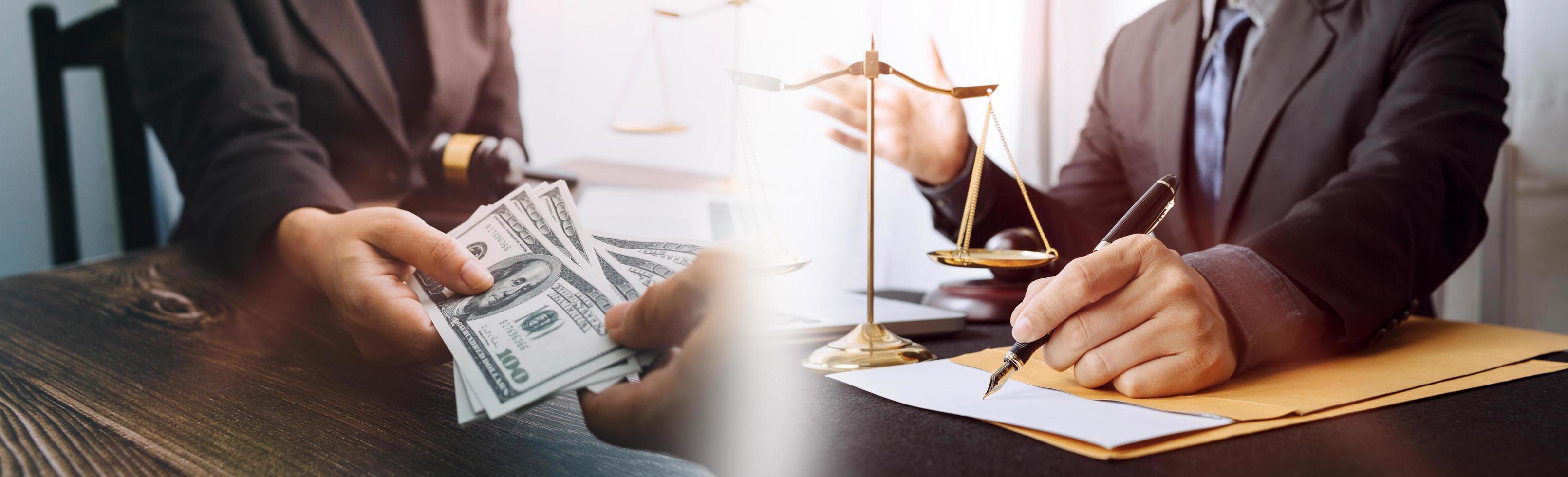 Business and lawyers discussing contract papers with brass scale on desk in office. Law, legal services, advice, justice and law concept picture with film grain effect photo