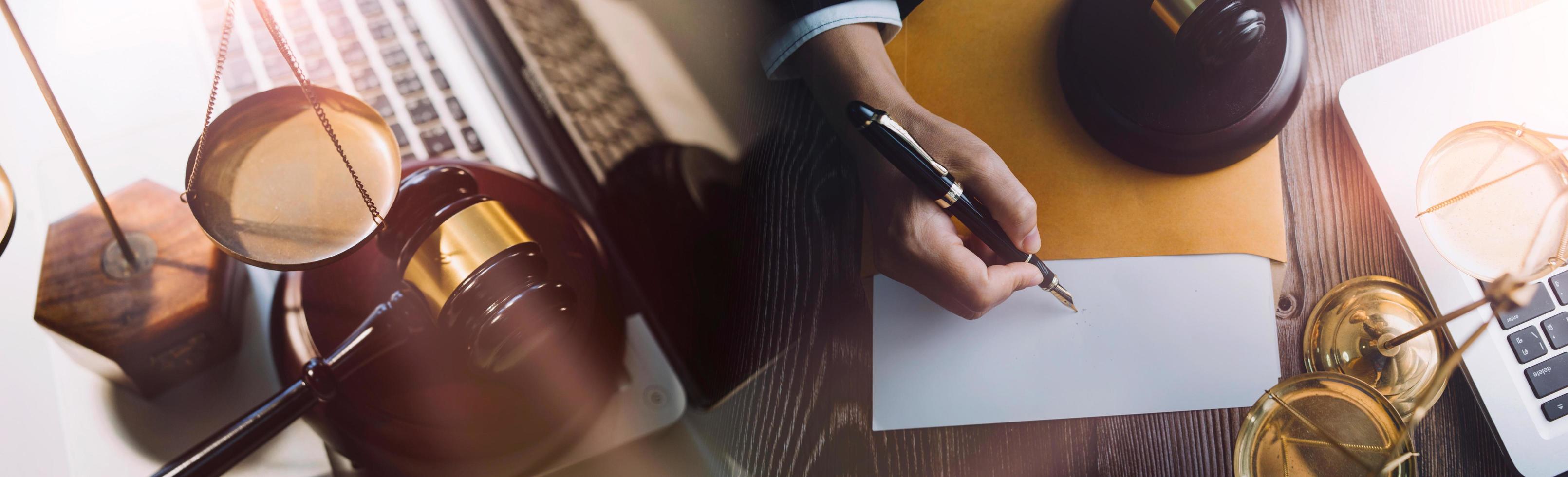 Business and lawyers discussing contract papers with brass scale on desk in office. Law, legal services, advice, justice and law concept picture with film grain effect photo