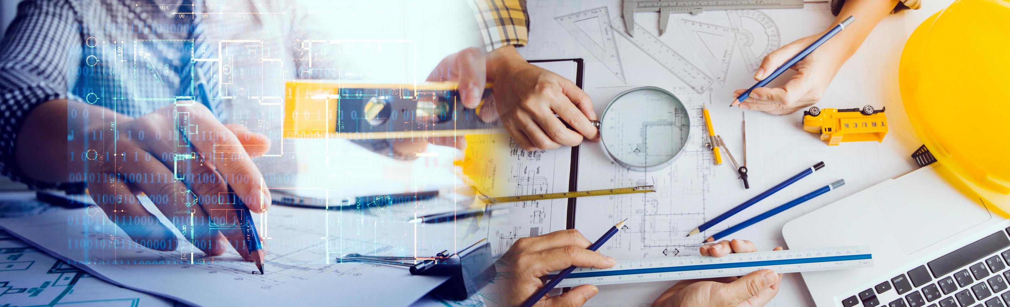 Two colleagues discussing data working and tablet, laptop with on on architectural project at construction site at desk in office photo