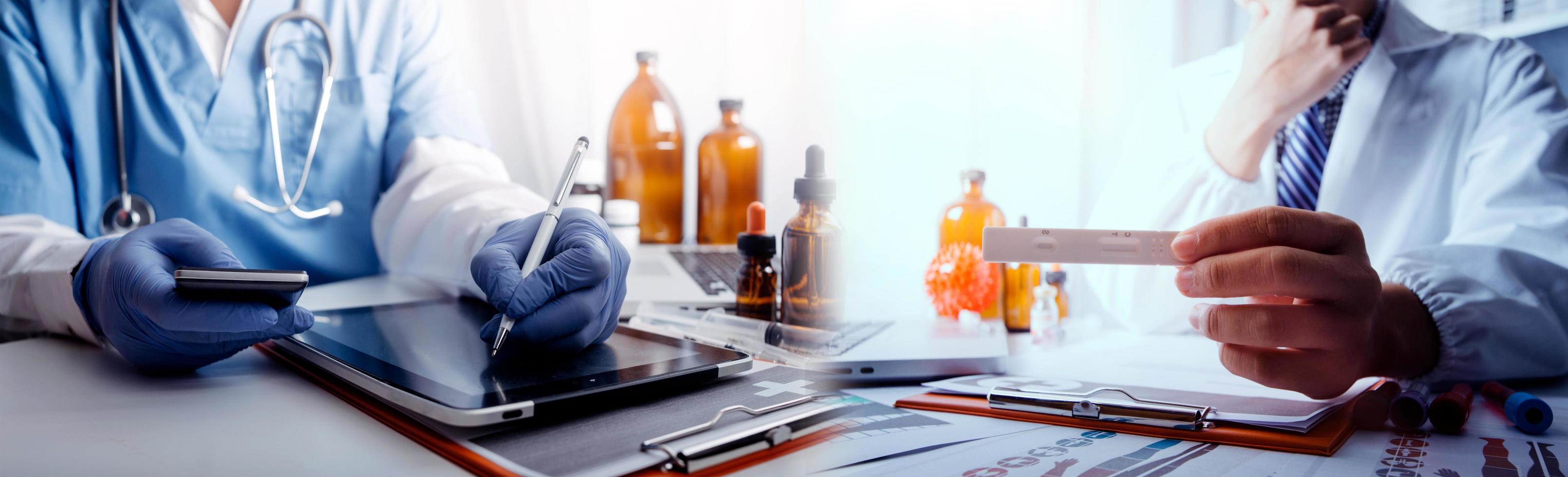 Medicine doctor hand working on a patients x-ray scans digital healthcare and connection with modern virtual screen interface icons, Medical technology and network concept. photo