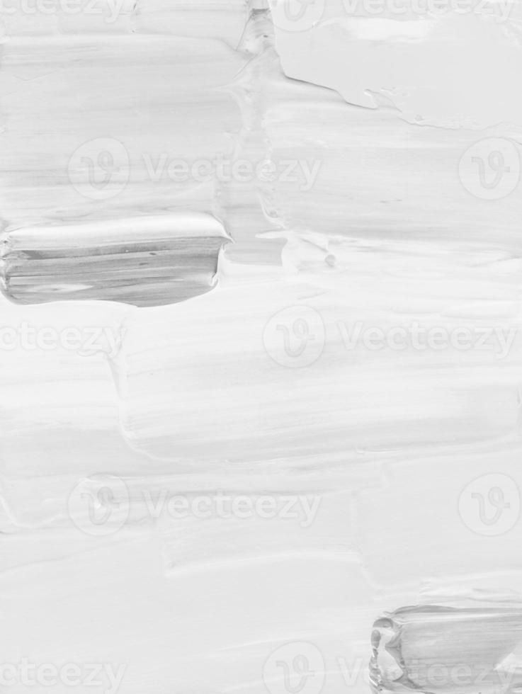 White and grey background texture. Light monochrome backdrop. Brush strokes on paper. Minimalist artwork photo