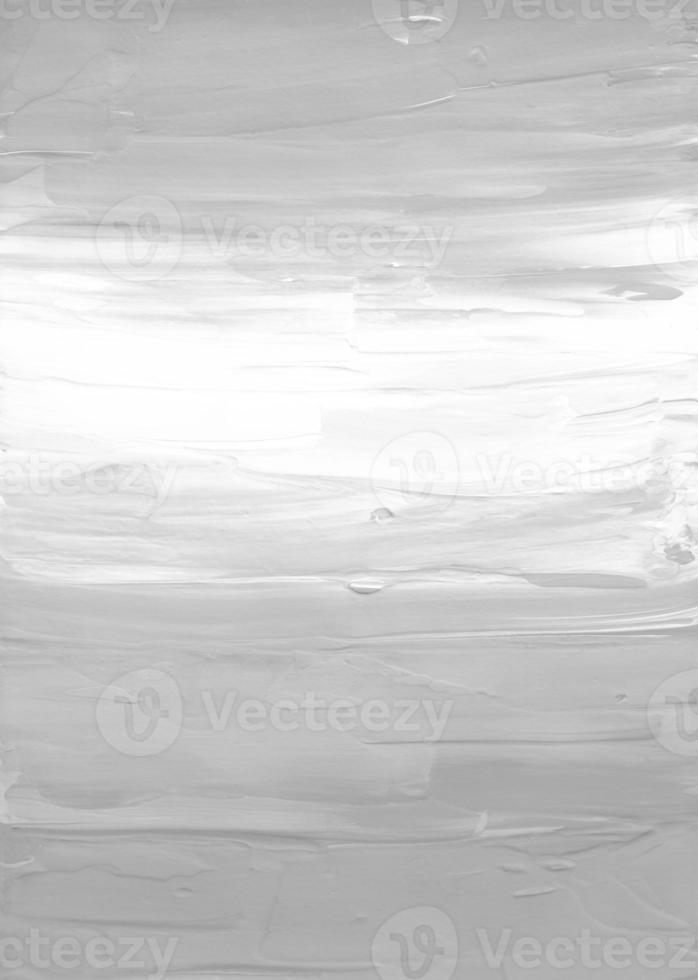 Abstract white and grey textured background. Light monochrome overlay. Brush strokes on paper. Gray and white backdrop. Minimalist painting. photo