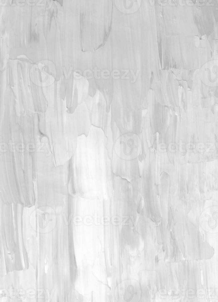 Abstract white textured background. Light monochrome backdrop. Gray and white painting. Brush strokes on paper. photo