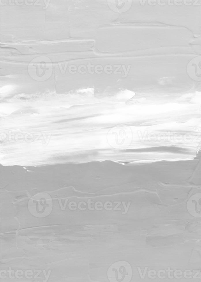 Abstract white and grey textured background. Light monochrome overlay. Gray and white backdrop. Minimalist painting. Brush strokes on paper. photo
