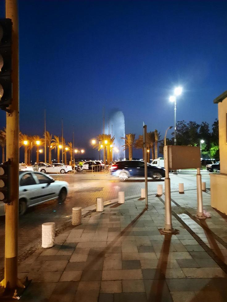 Jeddah, Saudi Arabia, Sep 2022 - Beautiful view of Jeddah Corniche and Jeddah Fountain at night. Jeddah Fountain is one of the tallest fountains in the world. photo