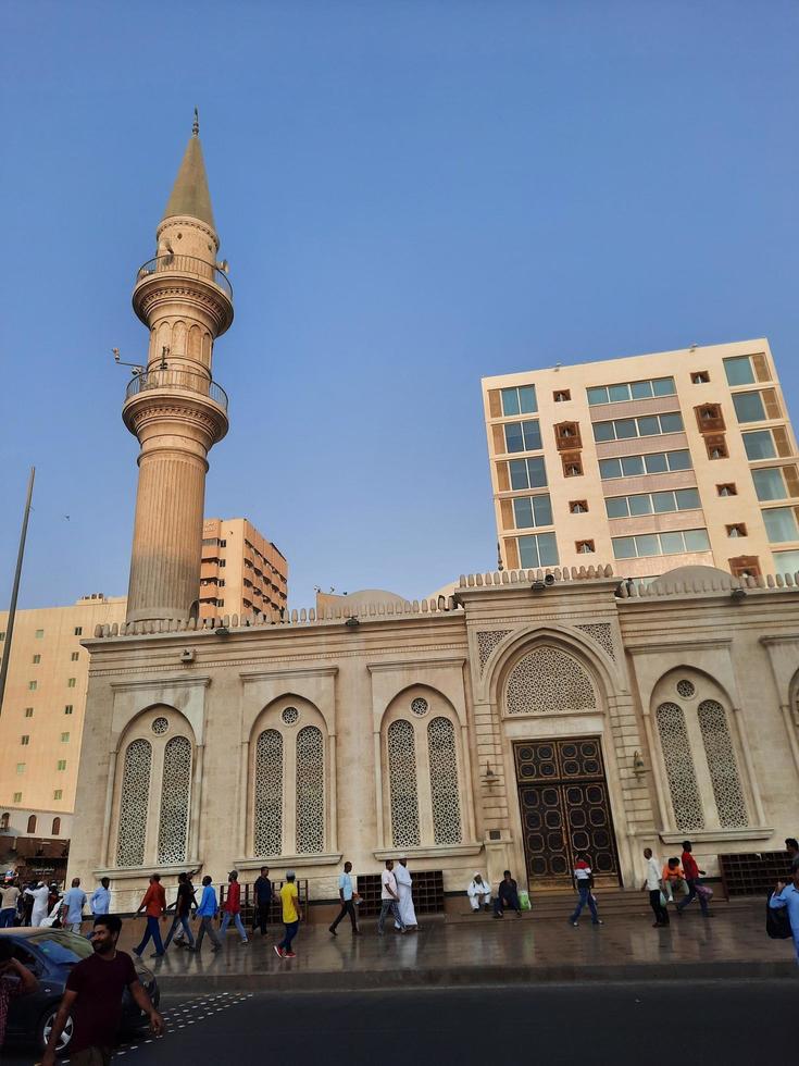 Jeddah, Saudi Arabia, Sep 2022 - In the evening, there are large numbers of people and vehicles on the streets of Balad, Jeddah. Balad is the main commercial center of Jeddah, Saudi Arabia. photo