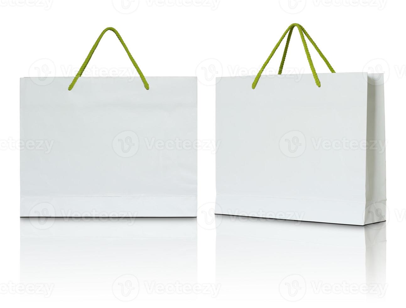 white paper shopping bag on white background photo