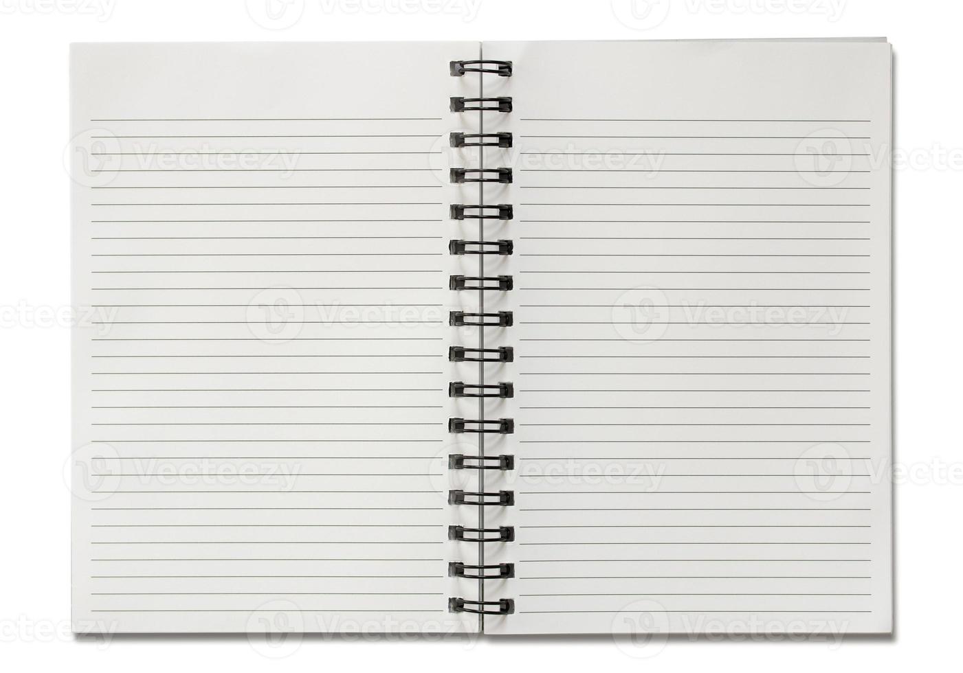blank spiral notebook isolated on white background photo