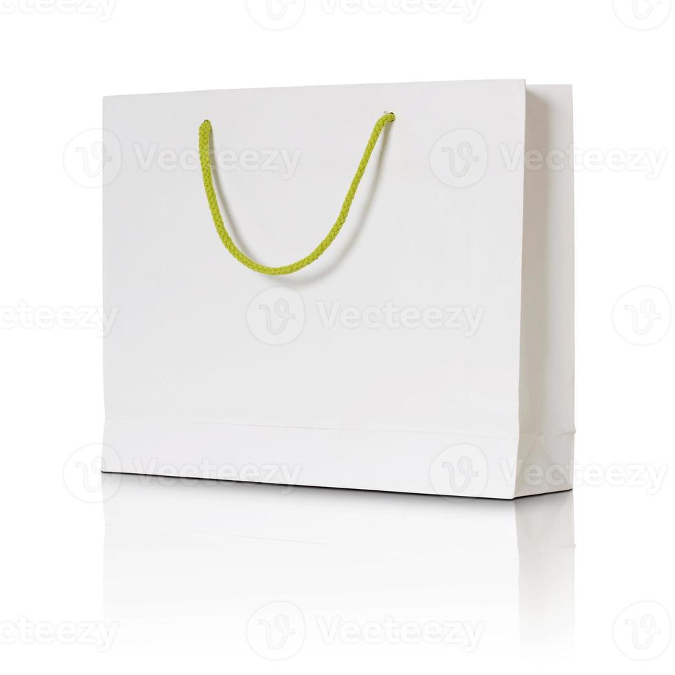 white paper shopping bag on white background photo