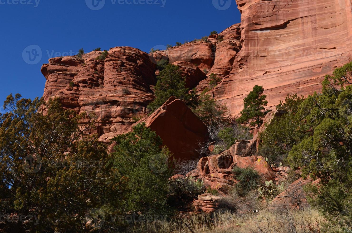 Dark Blue Skies Over a Red Rock Formation photo