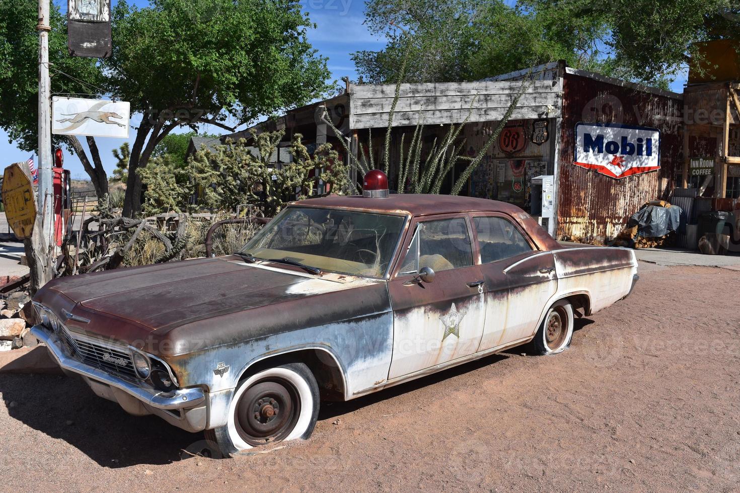 Old Rusting Sheriff's Car in Hackberry Arizona photo