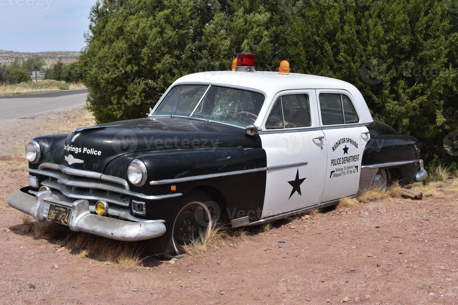 Broken Down Old Fashioned Police Car in Arizona photo