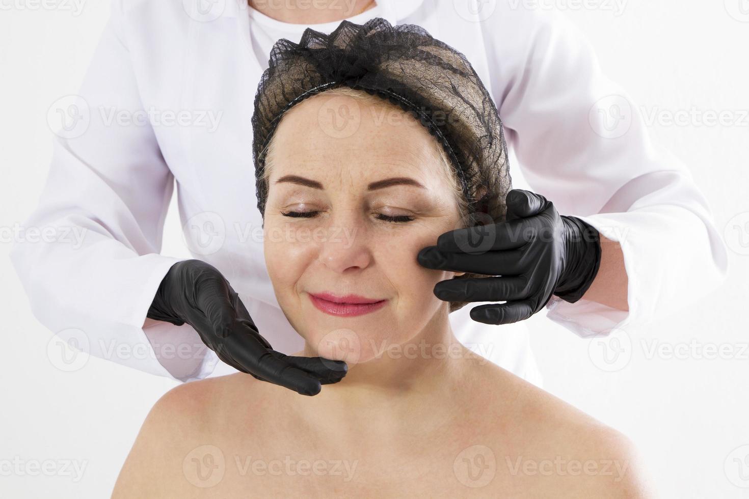 Middle age woman plastic surgery - before procedure isolated on white background, botox injection concept, beauty concept photo