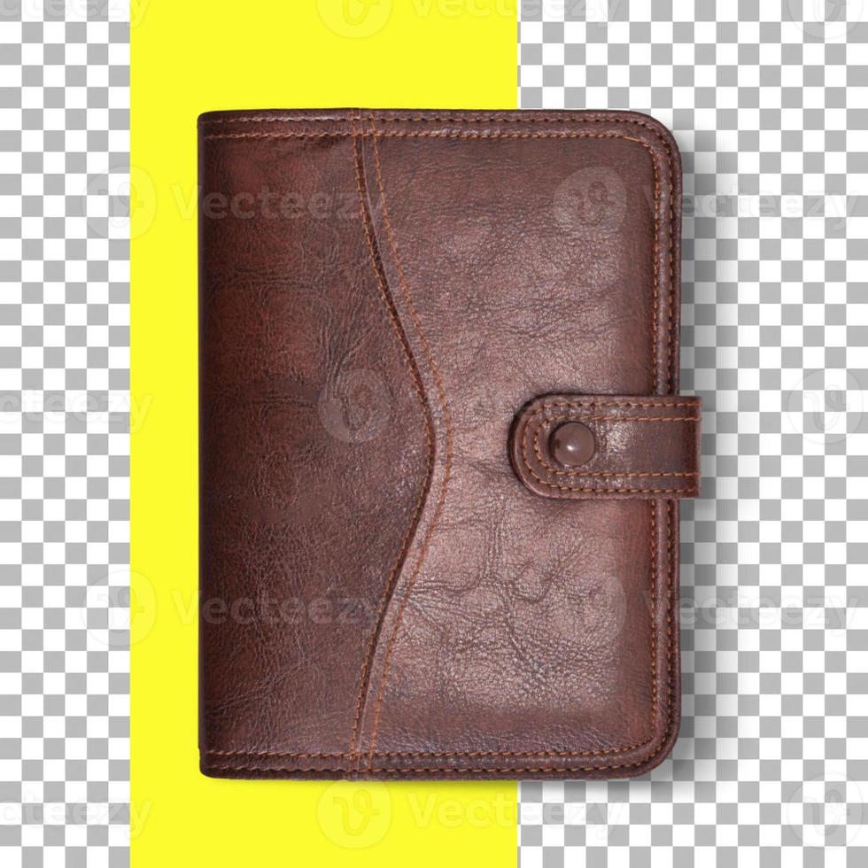 Close up view brown leather agenda isolated on yellow transparent background. photo