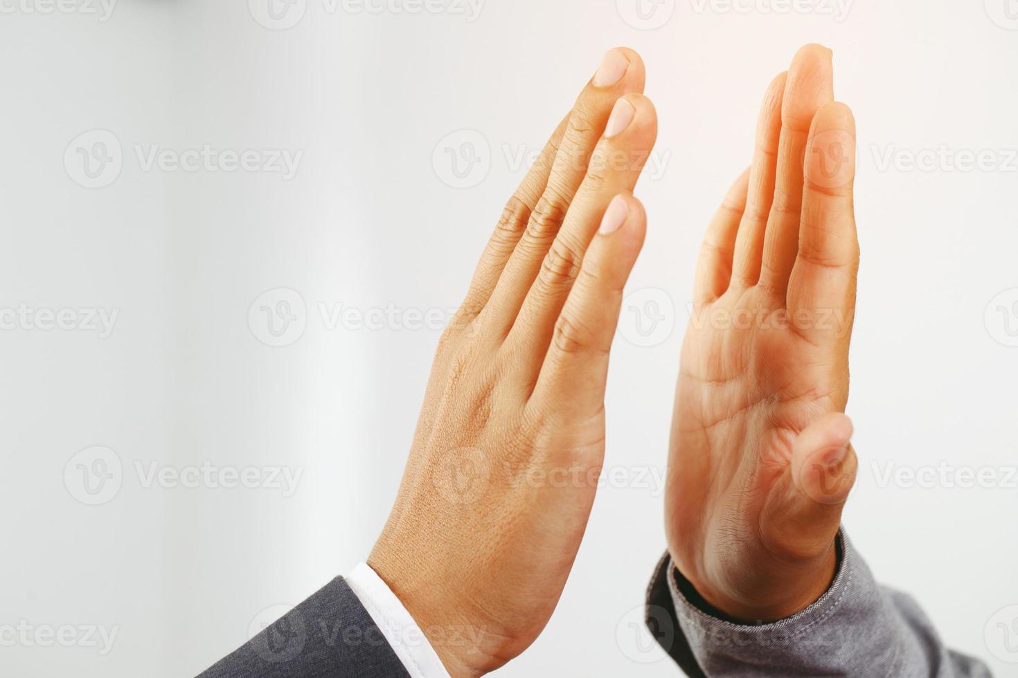 business people shaking hands congratulating sales photo